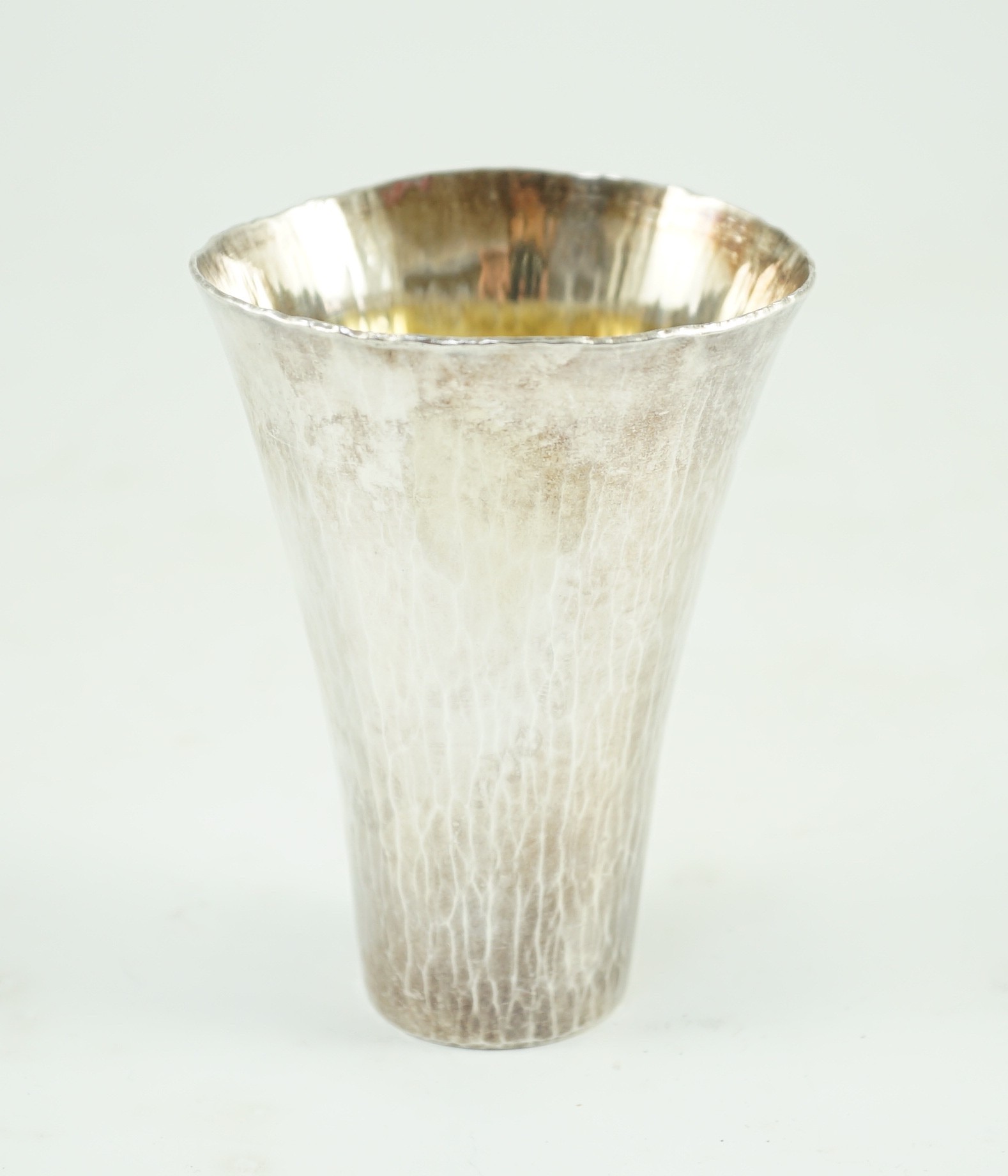 A modern Britannia standard planished silver cup, by Malcolm Appleby